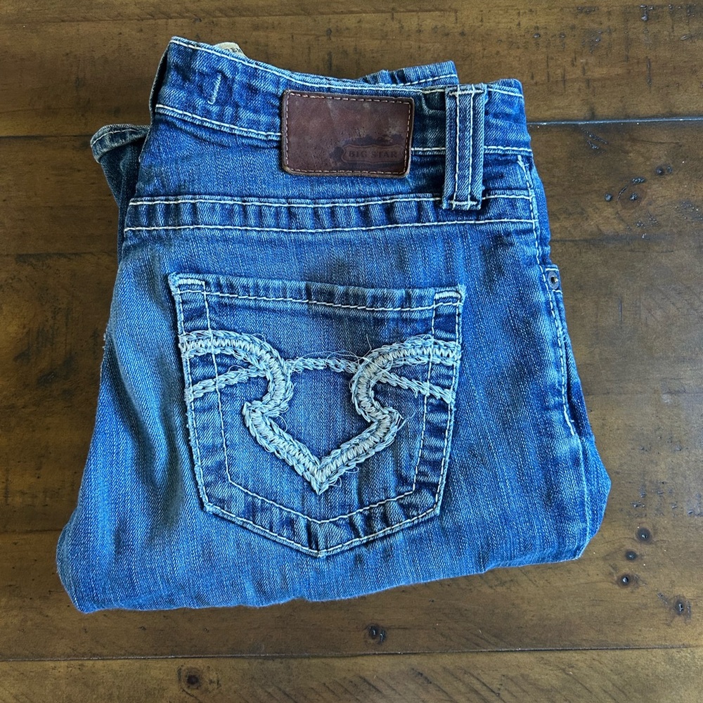 big star distressed lowrise bootcut jeans with embroidered pocket design